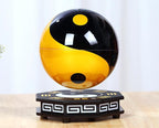 Yin and yang symbol on a spherical object with a base