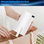 Smart projector held delicately with one hand, placed inside a beige handbag.