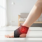 Electric wrist brace with heating element on a white background, labeled 'Plug-in'.